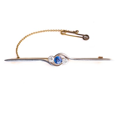 Lot 44 - A diamond and sapphire bar brooch