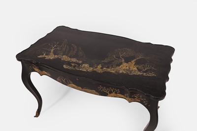 Lot 35 - A black and gilt-japanned low table in the Louis XV taste