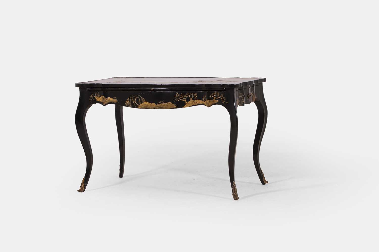 Lot 35 - A black and gilt-japanned low table in the Louis XV taste