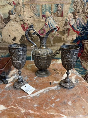 Lot 17 - A Victorian silver 'Cellini' pattern ewer and two goblets