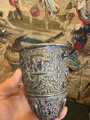 Lot 17 - A Victorian silver 'Cellini' pattern ewer and two goblets