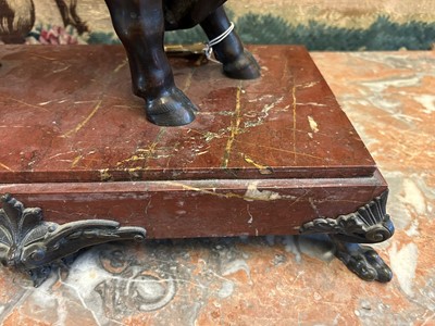 Lot 12 - A Louis XV-style patinated bronze mantel clock