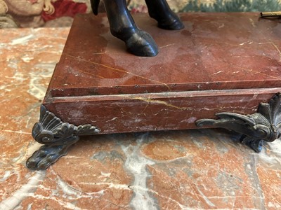 Lot 12 - A Louis XV-style patinated bronze mantel clock