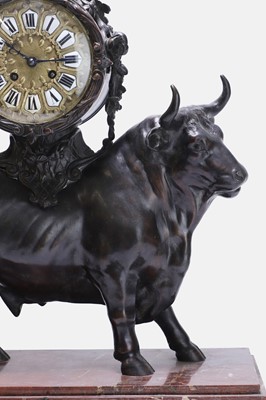 Lot 12 - A Louis XV-style patinated bronze mantel clock