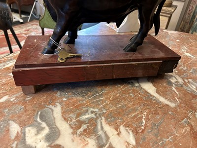 Lot 12 - A Louis XV-style patinated bronze mantel clock