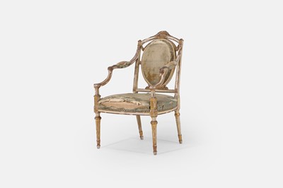 Lot 230 - A Louis XVI-style painted and gilded beech armchair
