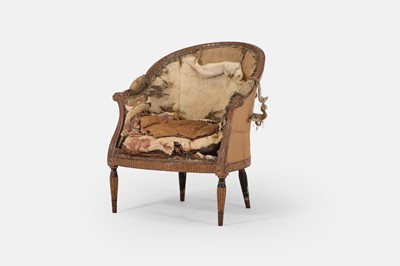 Lot 228 - A George III upholstered bergère armchair in the manner of Thomas Chippendale
