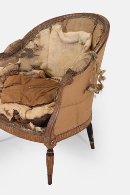 Lot 228 - A George III upholstered bergère armchair in the manner of Thomas Chippendale