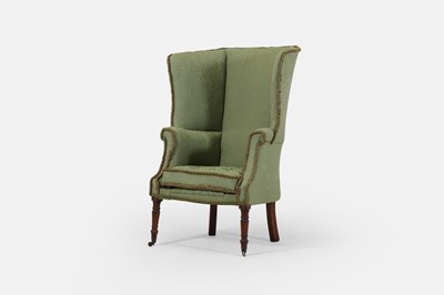 Lot 241 - A Regency upholstered wing armchair