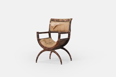 Lot 235 - A neoclassical beech 'X'-framed armchair