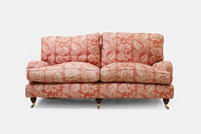 Lot 42 - A pair of upholstered sofas in the manner of Howard and Sons