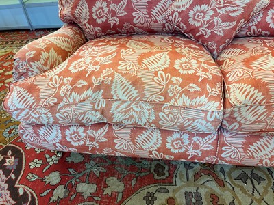 Lot 42 - A pair of upholstered sofas in the manner of Howard and Sons