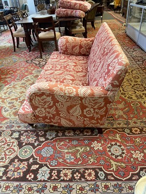 Lot 42 - A pair of upholstered sofas in the manner of Howard and Sons