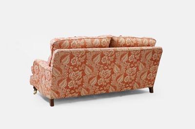 Lot 42 - A pair of upholstered sofas in the manner of Howard and Sons