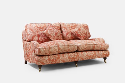 Lot 42 - A pair of upholstered sofas in the manner of Howard and Sons