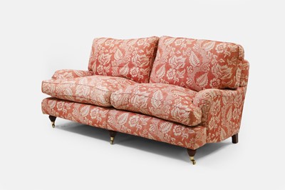 Lot 42 - A pair of upholstered sofas in the manner of Howard and Sons