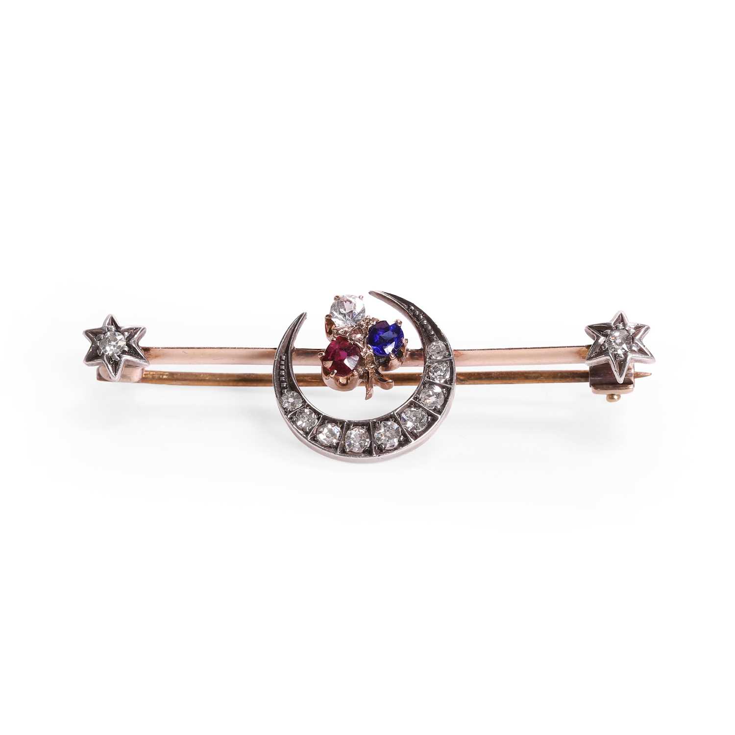 Lot 40 - A late Victorian diamond and gemstone set crescent bar brooch
