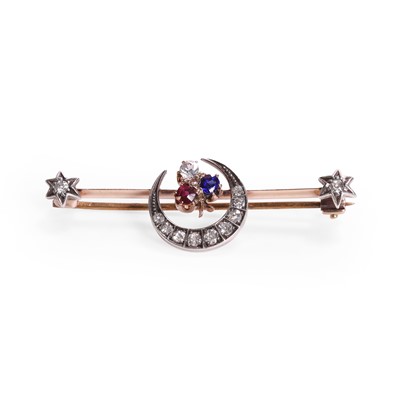 Lot 40 - A late Victorian diamond and gemstone set crescent bar brooch
