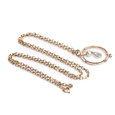 Lot 55 - An aquamarine, cultured pearl, and diamond pendant necklace