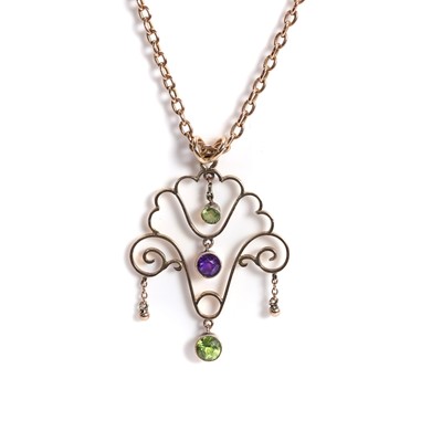Lot 56 - An amethyst and peridot pendant necklace