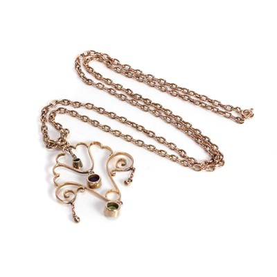 Lot 56 - An amethyst and peridot pendant necklace