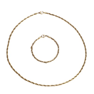 Lot 225 - An 18ct gold chain and matching bracelet