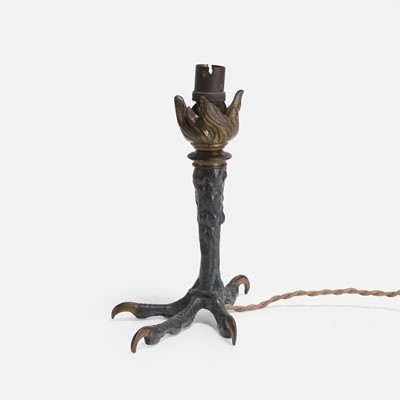 Lot 366 - A cast patinated-bronze clawed-foot table lamp