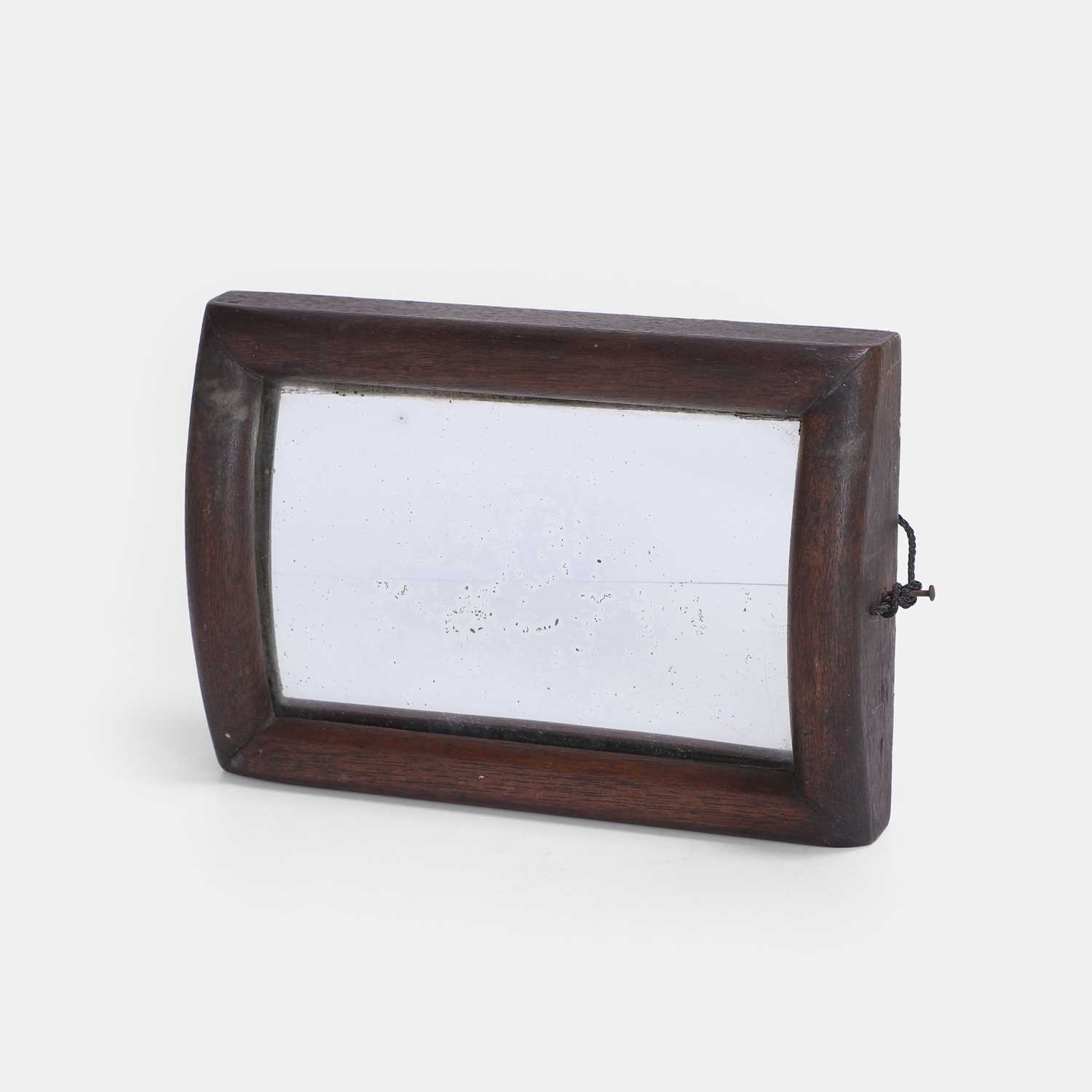 Lot 58 - A curved illusion mirror