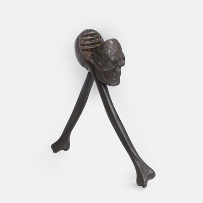 Lot 190 - A fiendish pair of cast iron skull-and-crossbones nutcrackers