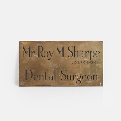 Lot 404 - A dentist's brass and enamelled name plaque