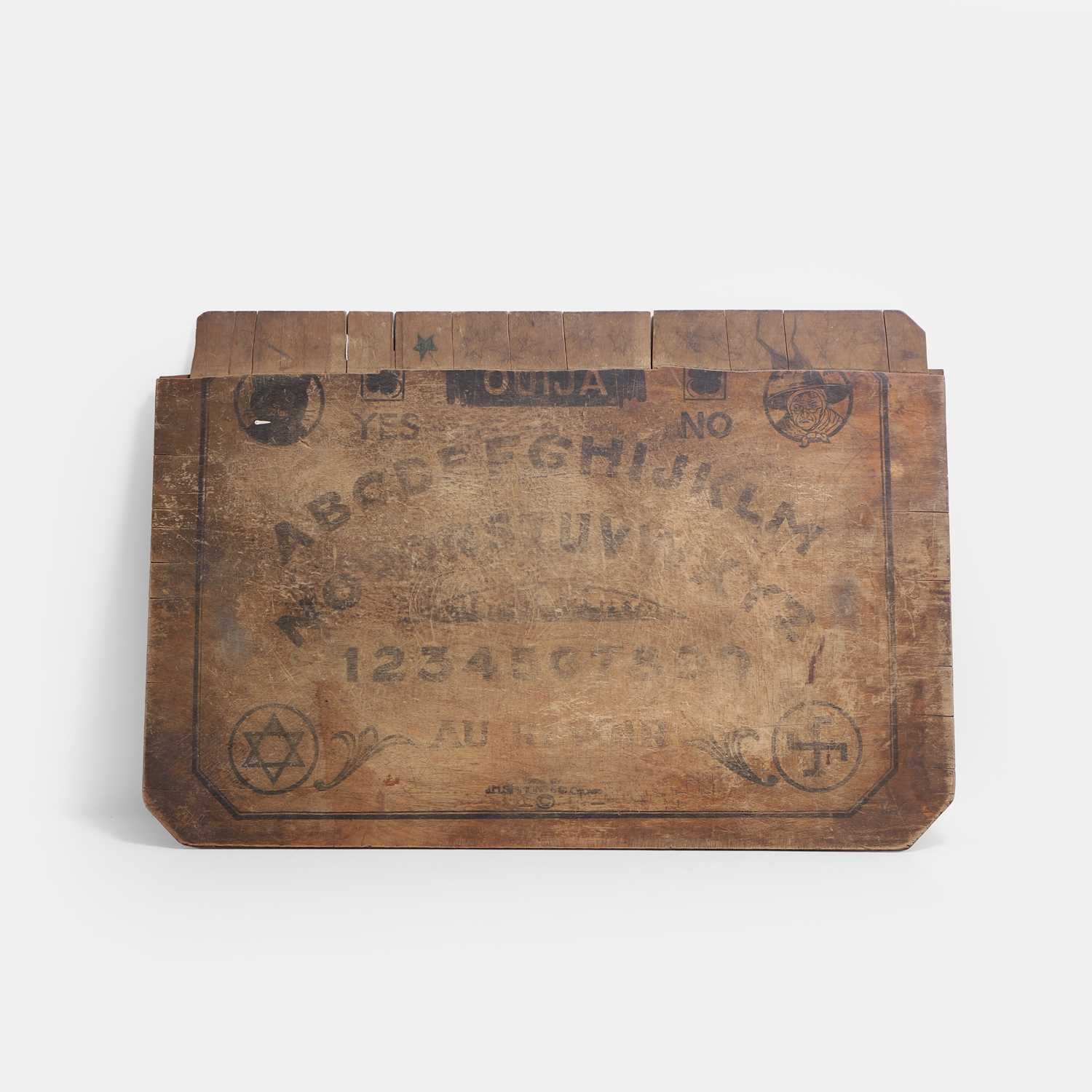 Lot 19 - A Ouija board