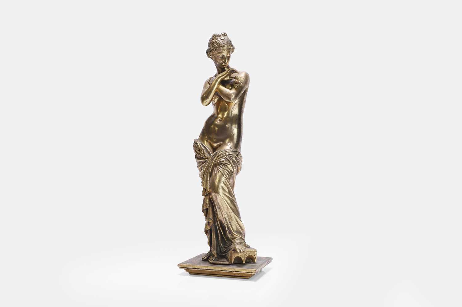 Lot 311 - A gilt-bronze figure of Venus