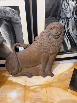 Lot 156 - A carved wooden figure of a lion