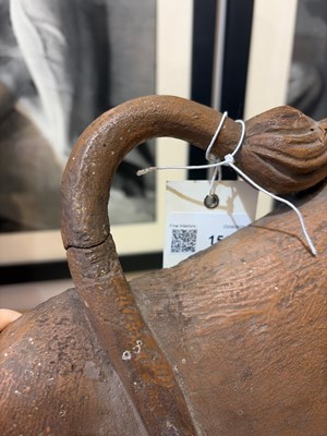 Lot 156 - A carved wooden figure of a lion