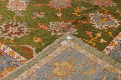 Lot 85 - An Oushak wool carpet