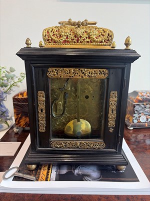 Lot 436 - A William and Mary basket-top bracket clock