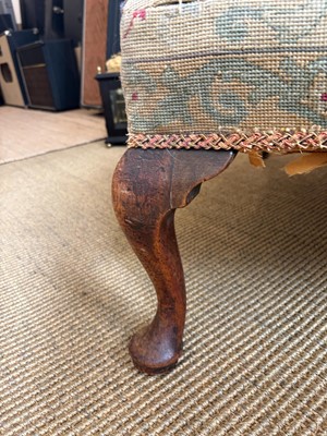 Lot 441 - A George III walnut library armchair