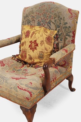 Lot 441 - A George III walnut library armchair