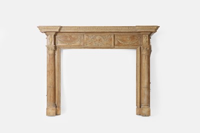Lot 273 - A George III-style carved pine and composition chimneypiece