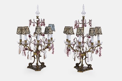 Lot 315 - A pair of gilt-brass, clear glass and amethyst glass table lamps