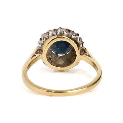 Lot 76 - A sapphire and diamond cluster ring