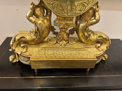 Lot 33 - An ormolu perpetual calendar mantel clock