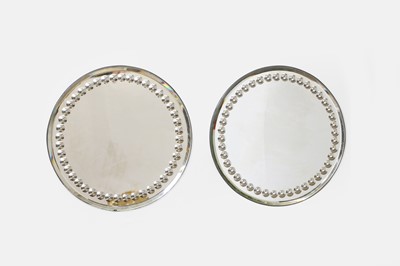 Lot 654 - A pair of sorcerers' mirrors