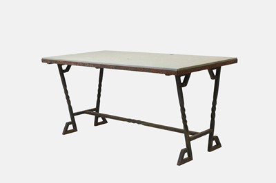 Lot 657 - An iron-framed limestone garden table