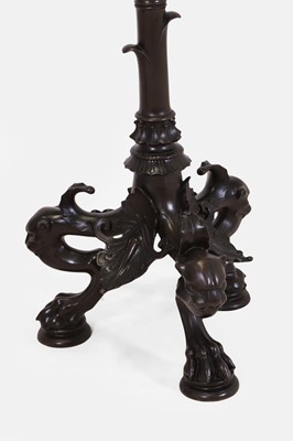 Lot 57 - A pair of patinated bronze floor lamps