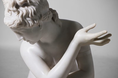 Lot 53 - A large marble figure of 'The Crouching Venus'