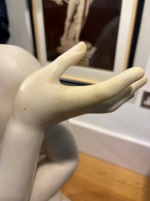 Lot 53 - A large marble figure of 'The Crouching Venus'