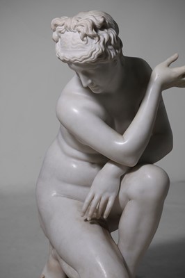 Lot 53 - A large marble figure of 'The Crouching Venus'