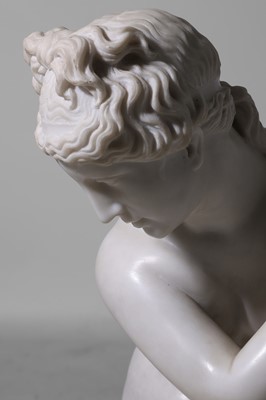 Lot 53 - A large marble figure of 'The Crouching Venus'