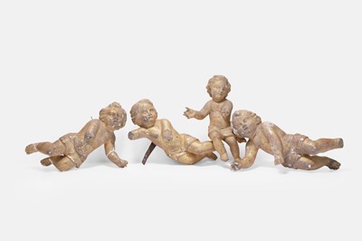 Lot 641 - Four carved giltwood cherub figures